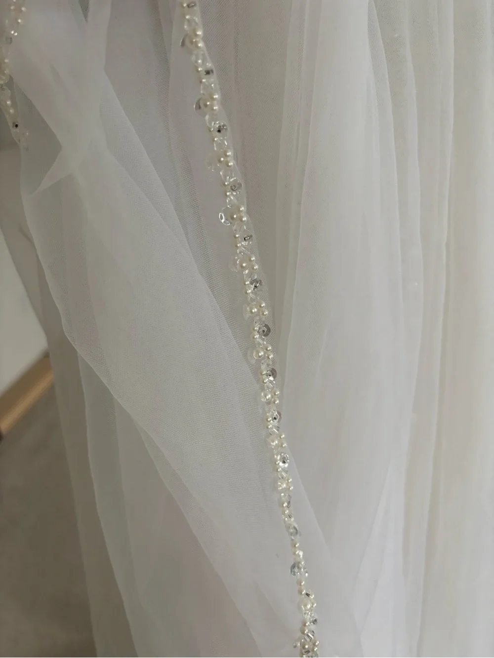 Pearl beaded wedding veil with blusher